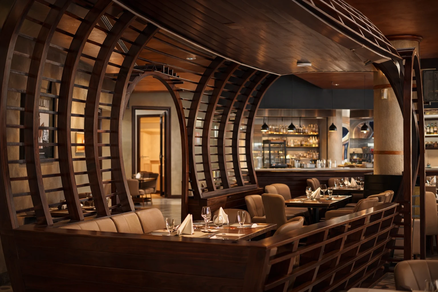 Warm wooden arches and intimate dining tables